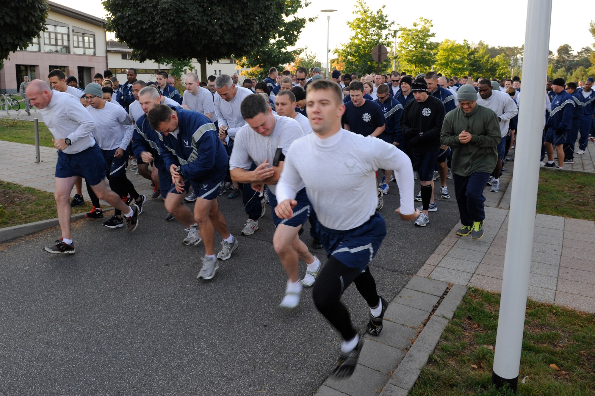 Airmen and Soldiers start a 5k run to honor prisoners of war and those missing in action on Ramstein, Germany, Sept. 21, 2012. U.S. military members used the week to remember the sacrifices and service of our nations POW’s, as well as those who are still MIA. (U.S. Air Force photo/ Senior Airman Aaron-Forrest Wainwright)