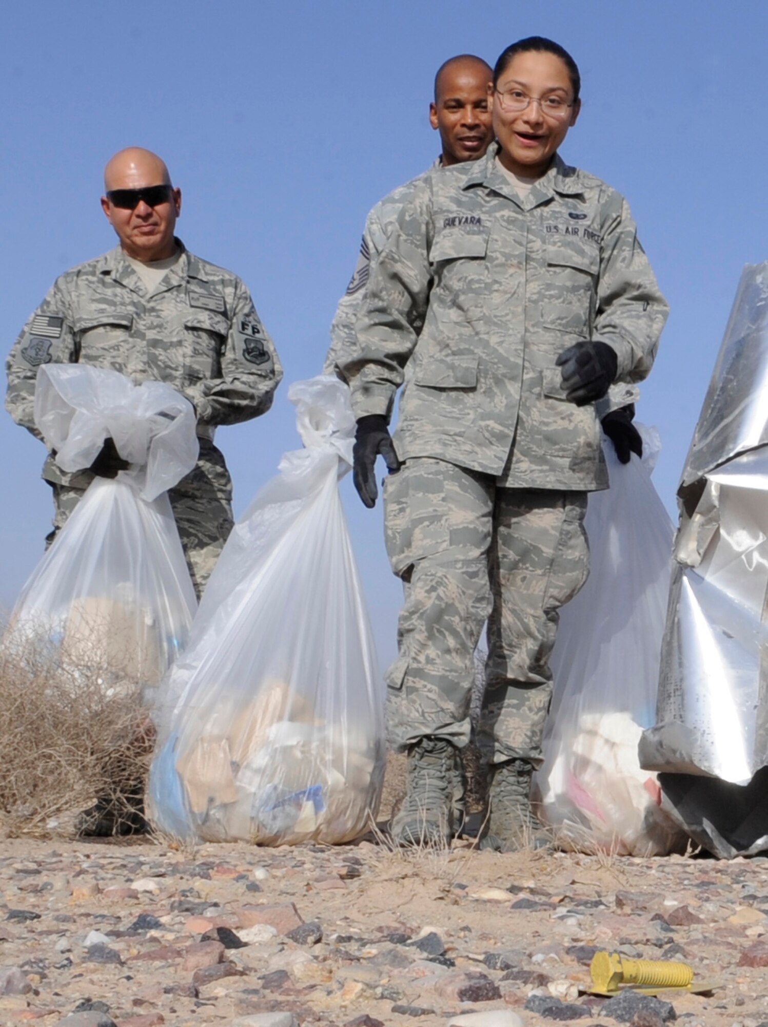 SOUTHWEST ASIA – Senior Airman Ana Guevara, 386th Expeditionary Force Support Squadron, finds one of the five golden bolts during the semi-annual wing foreign object debris walk here Sept. 22.  (U.S. Air Force photo/Staff Sgt. Alexandra M. Boutte)