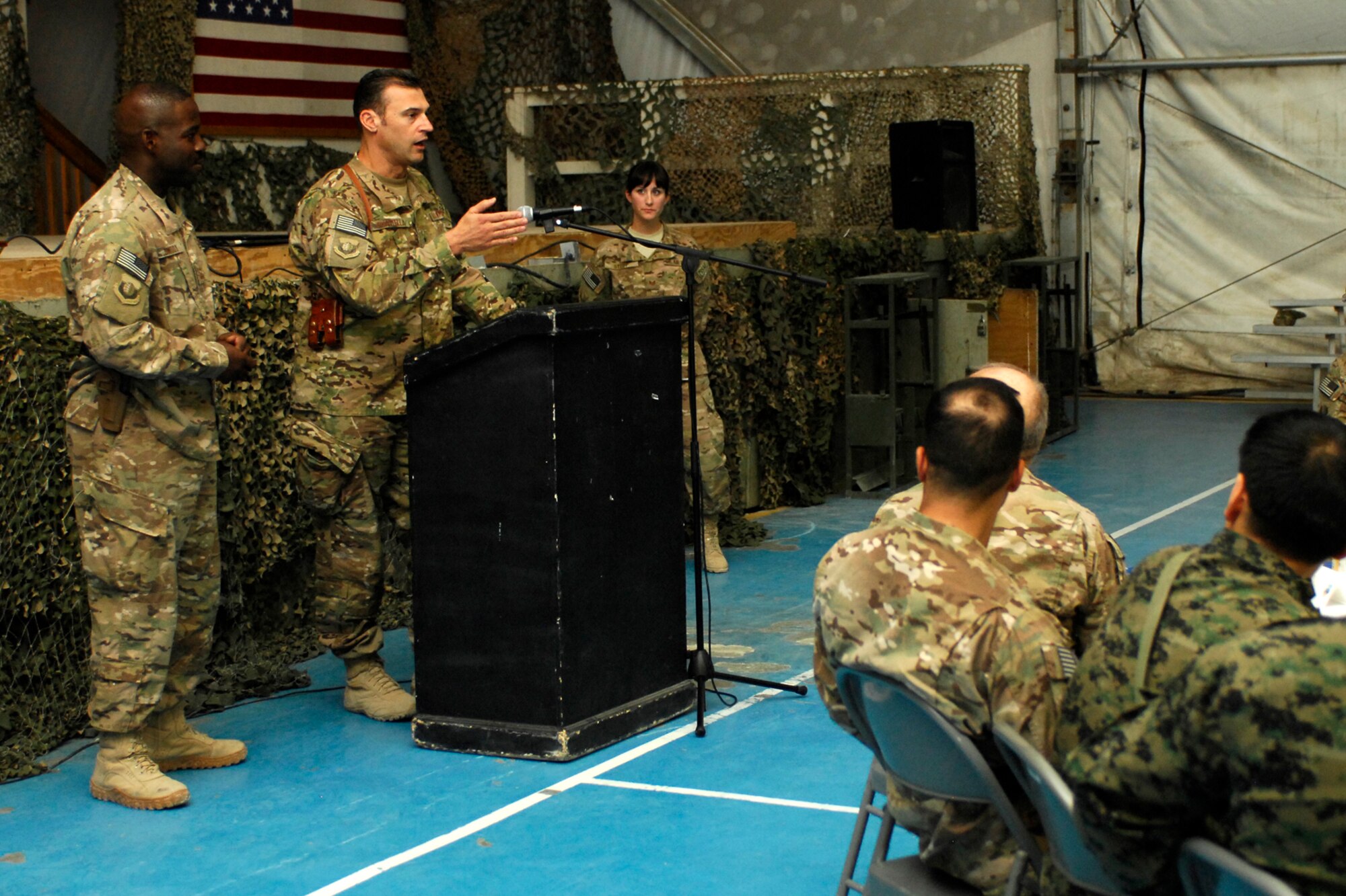Brig. Gen. Joseph Guastella, 455th Air Expeditionary Wing commander, bids a fond farewell to Command CMSgt Marcus Snoddy (left), 455 AEW Command Chief, prior to his departure during the chief’s going-away ceremony at Bagram Airfield, Afghanistan Sept. 23, 2012. Snoddy encouraged Airmen and Soldiers to continue to do their best to make the mission a success in Afghanistan. Chief Snoddy had been the 455 AEW Command Chief since Sept. 2011. (U.S. Air Force photo/SSgt Jeff Nevison)