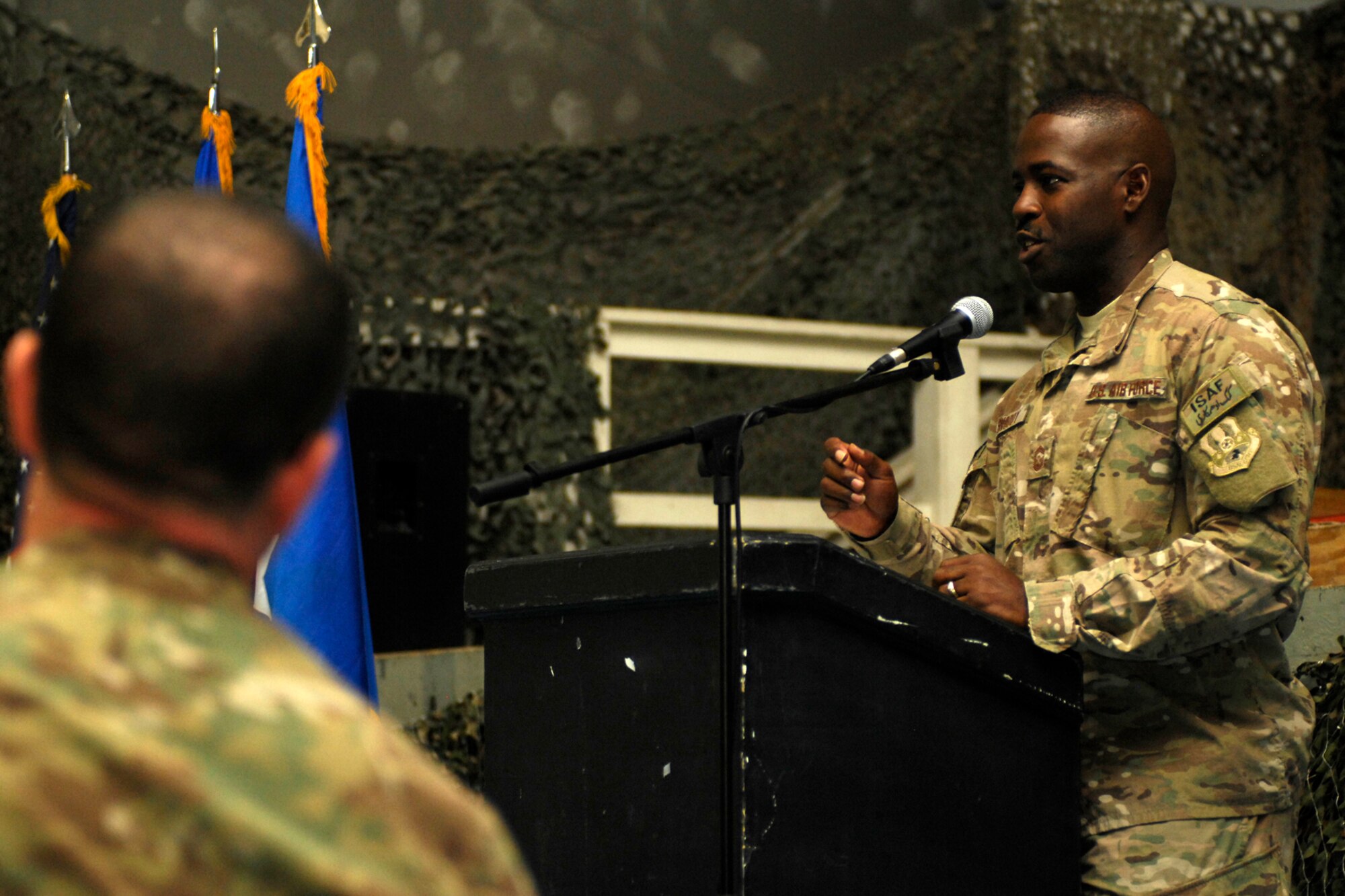 Command CMSgt. Marcus Snoddy, 455th Air Expeditionary Wing Command Chief, encourages and thanks attendees at his going-away ceremony at Bagram Airfield, Afghanistan Sept. 23, 2012. Snoddy encouraged Airmen and Soldiers to continue to do their best to make the mission a success in Afghanistan. Chief Snoddy had been the 455 AEW Command Chief since Sept. 2011. (U.S. Air Force photo/SSgt Jeff Nevison)