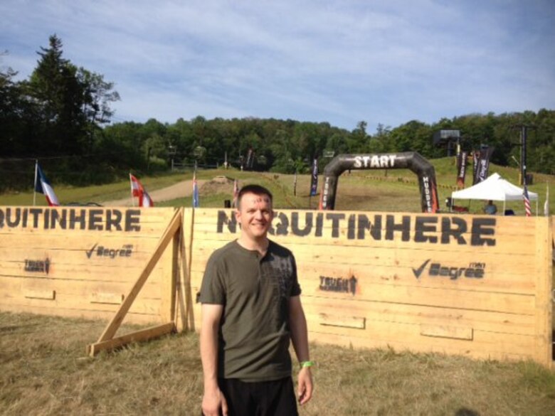 ERDC Deputy Commander Maj. Thomas Clair evaluates one of the many obstacles at the Tough Mudder event held recently at Vermont's Mount Snow.