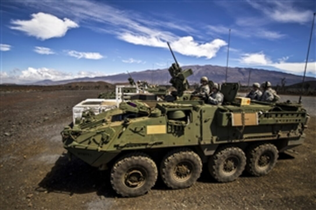 Soldiers engage targets 200 to 1,000 meters away during a live fire training exercise on Pohakuloa Training Area, Hawaii, Sept. 19, 2012.