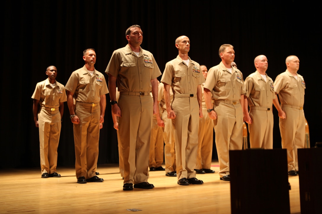 Chief petty officers selectees wait to have their new ranks pinned during a ceremony held aboard Marine Corps Base Camp Lejeune Sept. 14. Chief petty officers are E7 and hold a unique role in the Navy. 