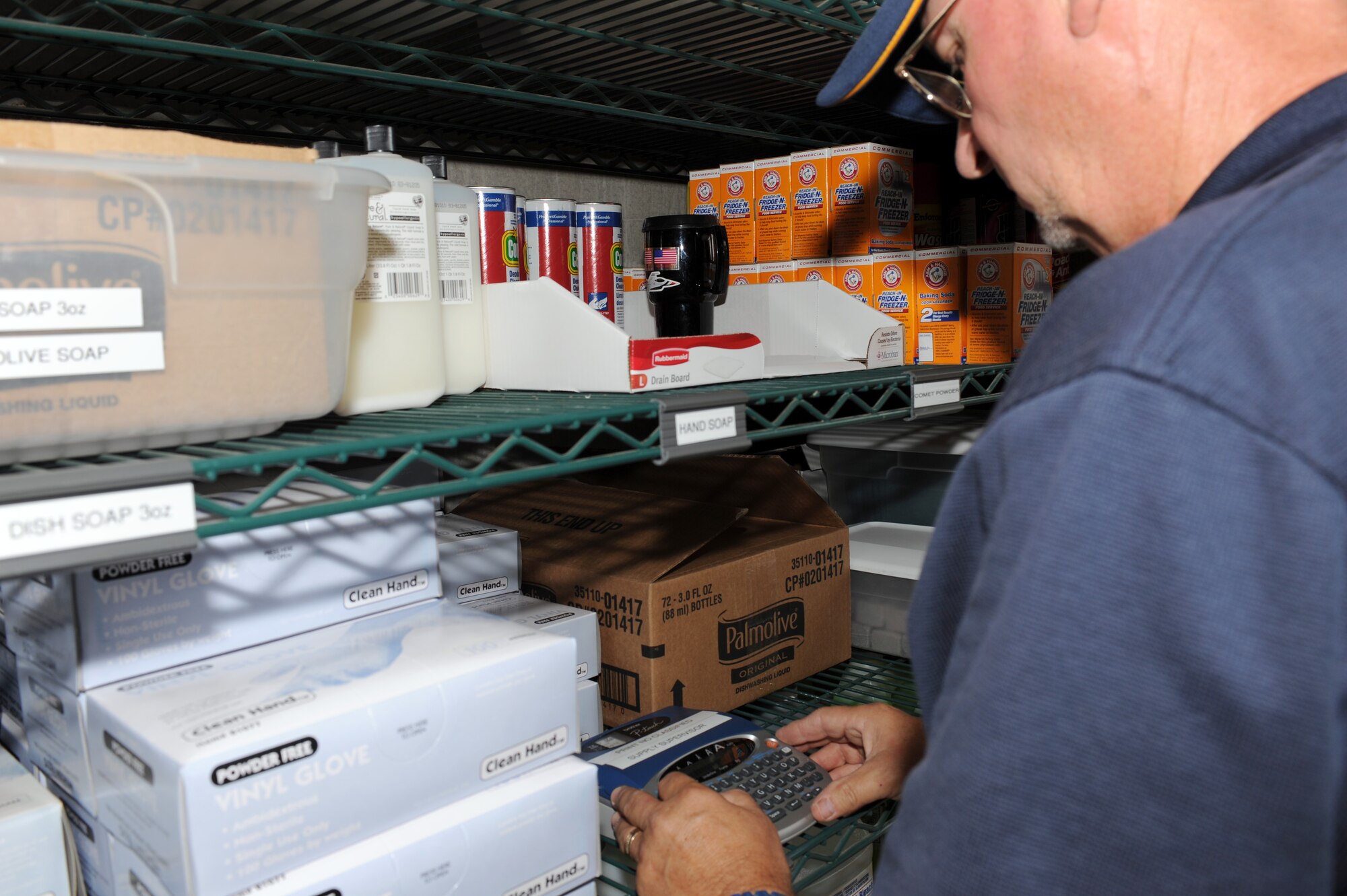 Donald Hughes, 355th Force Support materials handler, creates a label for the stockroom at the Inn on Davis-Monthan on Davis-Monthan Air Force Base, Ariz., Sept. 20, 2012. Hughes organized the stockroom ensuring items were properly located so that amenities are delivered and replaced in guest rooms as quickly as possible. (U.S. Air Force photo by Airman 1st Class Timothy Moore/Released)