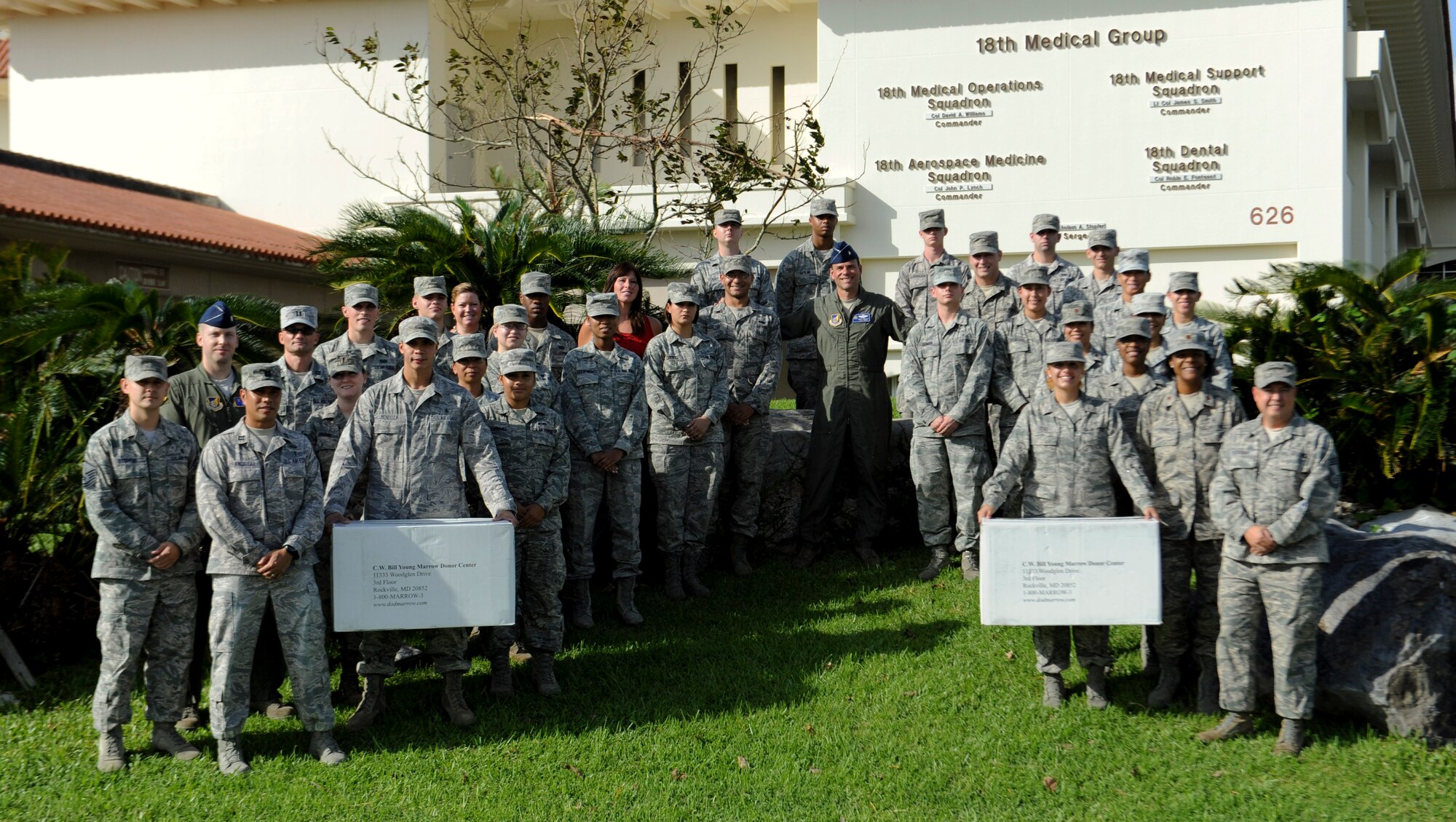 U.S. Air Force Brig. Gen. Matt Molloy, 18th Wing commander, poses with volunteers at Kadena Air Base, Japan, Sept. 26, 2012, who recently registered approximately 1,000 military and family members to become bone marrow donors. More than 100 Team Kadena members volunteered more than 100 hours registering potential bone marrow donors during a five-day lifesaving event earlier this month. 

"My father died of (Acute Myeloid Leukemia), that's when I became a bone marrow donor," explained Molloy. "I'm so proud of each and every one of you across the 20 squadrons. All the effort, all the time, and all the hours you committed convinced people that this was the right thing to. It would be my great honor to take a picture with you as we continue the effort to raise
awareness and volunteers for a life-giving cause."