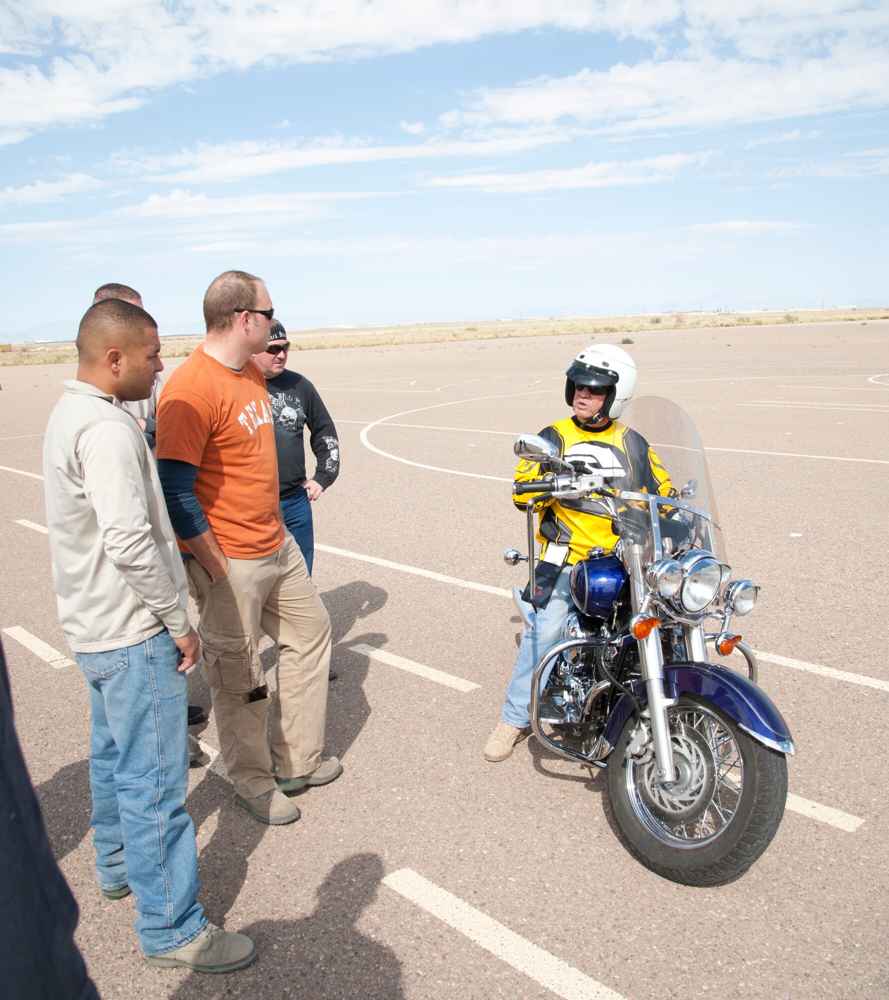 Daniel Salinas, 49th Wing ground safety specialist, explains a drill to participations of the Experienced Rider course at Holloman AFB, N.M., Sept. 25. In accordance with Air Force Instruction 91-207, riders must take an appropriate motorcycle safety foundation course to ride a motorcycle on and off duty. The military offers these classes for free to Airmen. (U.S. Air Force photo by Airman 1st Class Colin Cates/Released)


