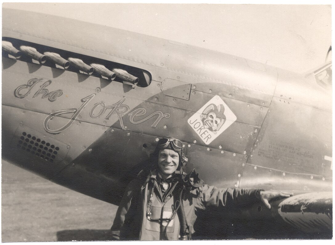 First Lt. Ted Fahrenwald, 486th Fighter Squadron pilot, stands in front of his P-51 Mustang, "The Joker." Fahrenwald, a Rapid City native, was flying his 100th combat mission when he was shot down over Nazi-occupied France and was aided by members of the French Resistance, known as the Maquis. (Madelaine Fahrenwald courtesy photo)