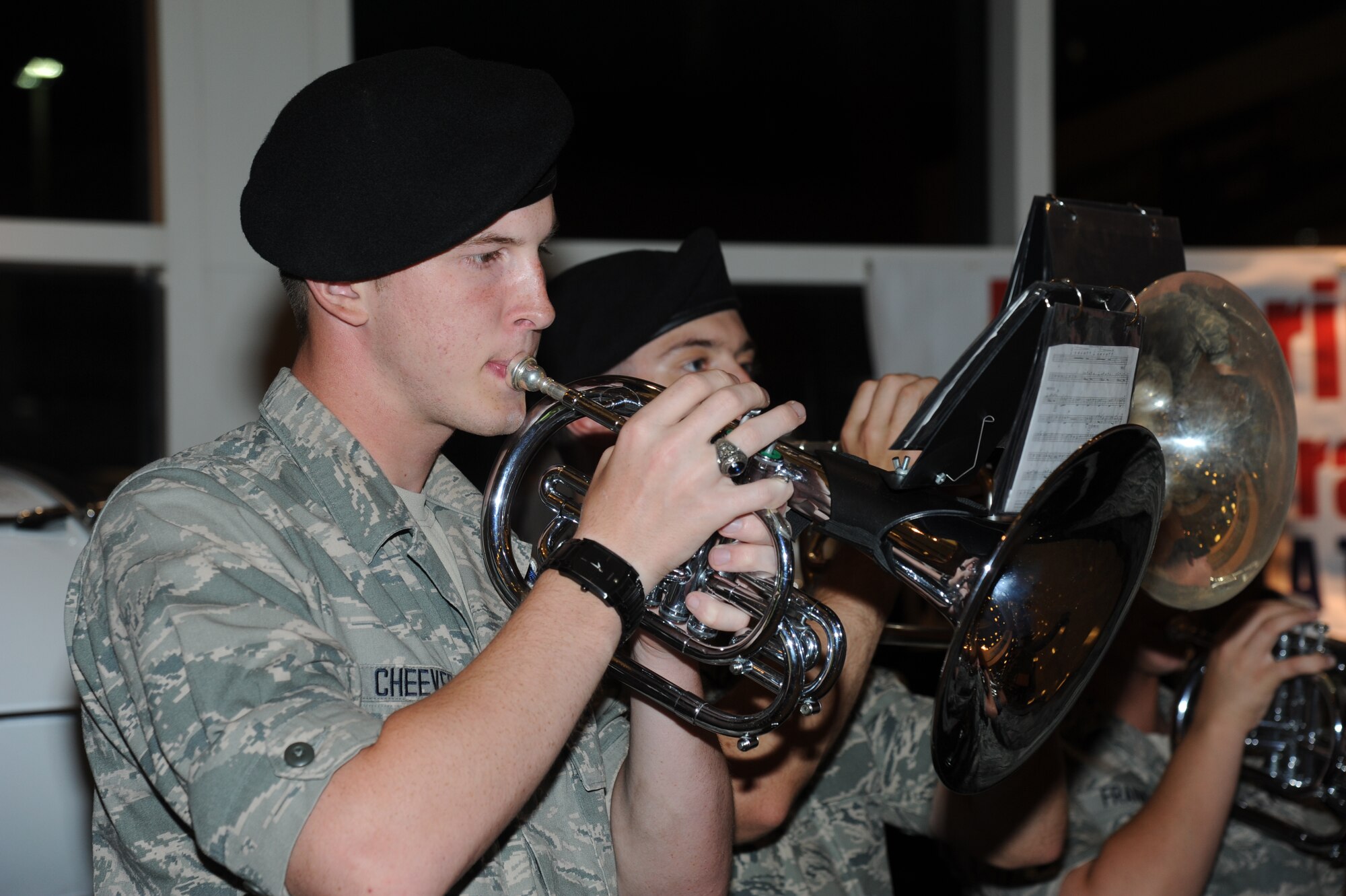 Airman Basic Zachary Cheever, 336th Training Squadron and a member of the Keesler Air Force Base, Miss., drum and bugle corps, plays “America the Beautiful” on his mellophone at the fourth  Mississippi Gulf Coast Honor Flight to Washington, D.C., Sept 25, 2012, at the Gulfport/Biloxi International Airport. The Honor Flight program receives donations to honor our nation’s World War II veterans by sending them on a one-day visit to Arlington National Cemetery in Washington, D.C.  (U.S. Air Force photo by Kemberly Groue)