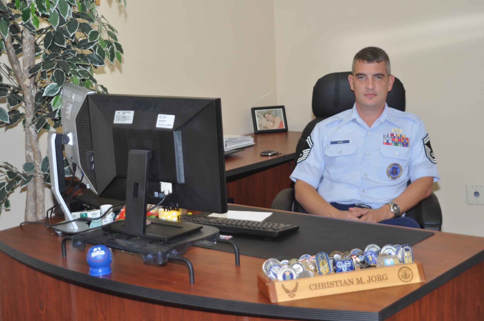 Senior Master Sgt. Christian M. Jorg, senior recruiter with the 944th Fighter Wing, a U.S. Air Force Reserve unit located at Luke Air Force Base, Ariz., poses for a portrait in his office. Jorg transferred to the 944th FW from Peterson Air Force Base, Colo. in August.  (U.S. Air Force/Tech Sgt. Phyllis Keith)