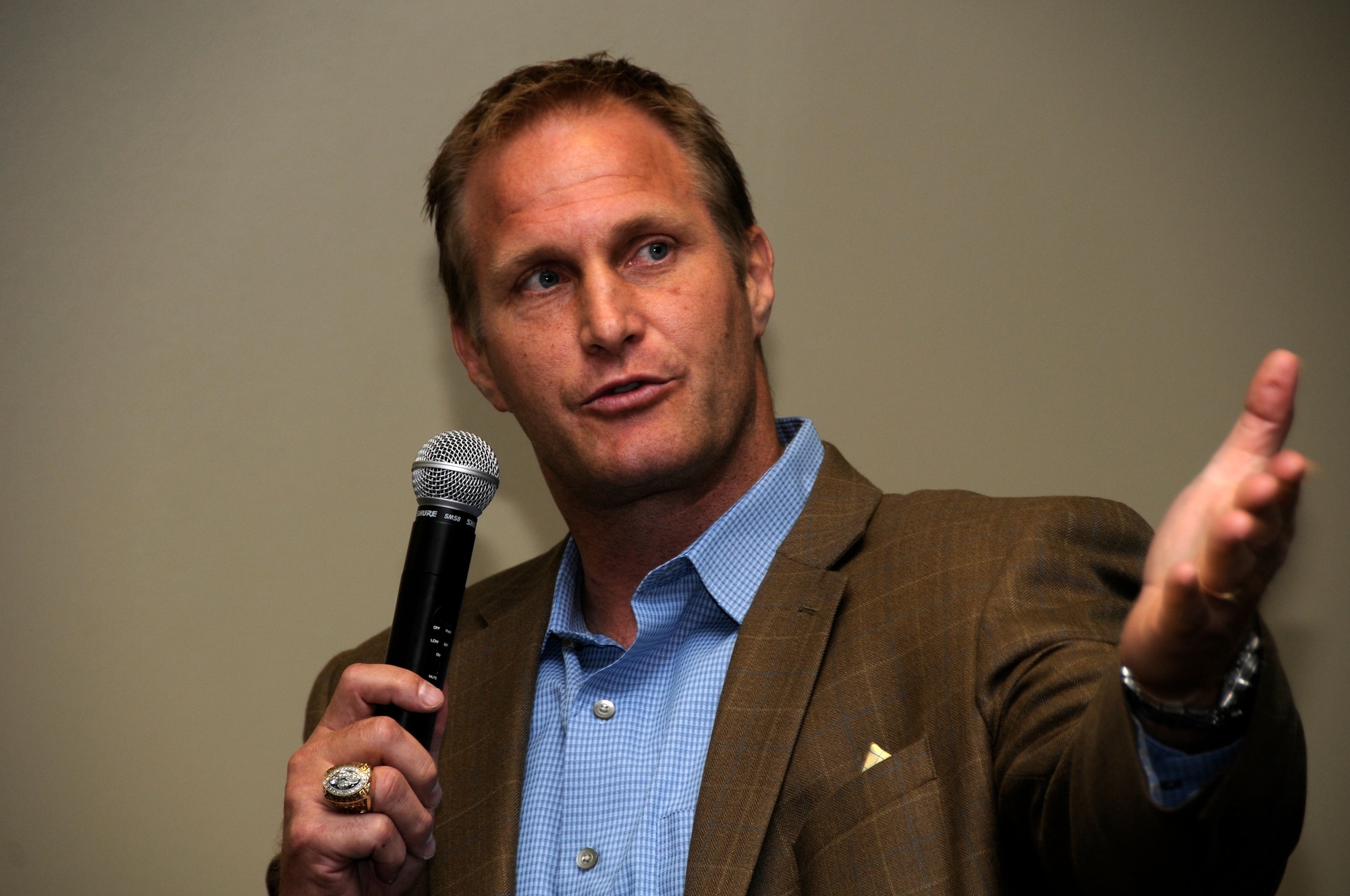 Chad Hennings, former A-10 pilot, Air Force Falcon and three-time Super Bowl champion with the Dallas Cowboys, speaks to Airmen with the 188th Fighter Wing Sept. 8. Hennings was the 188th’s keynote speaker for the unit’s Diversity Day program. (National Guard photo by Airman Cody Martin/188th Fighter Wing Public Affairs)