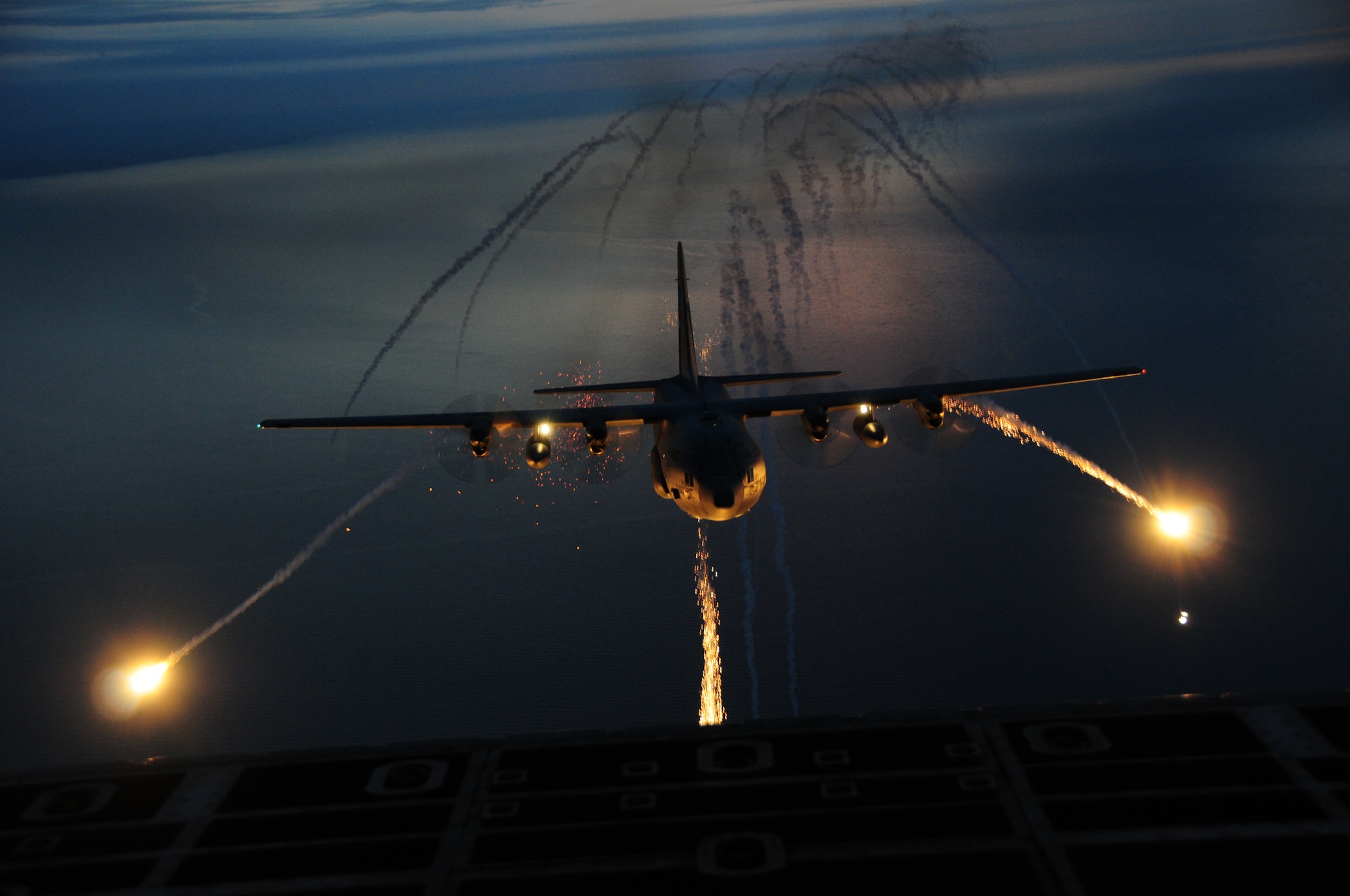 The 107th Airlift Wing went on another night formation training mission, this time fully loaded with live flares to be used in a training scenario.  A "Flare" is an aerial infrared countermeasure to counter and infrared homing (heat seeking) surface-to air or air-to-air missile. Sept. 25, 2012 (U.S. Air Force Photo/Senior Master Sgt. Ray Lloyd)
