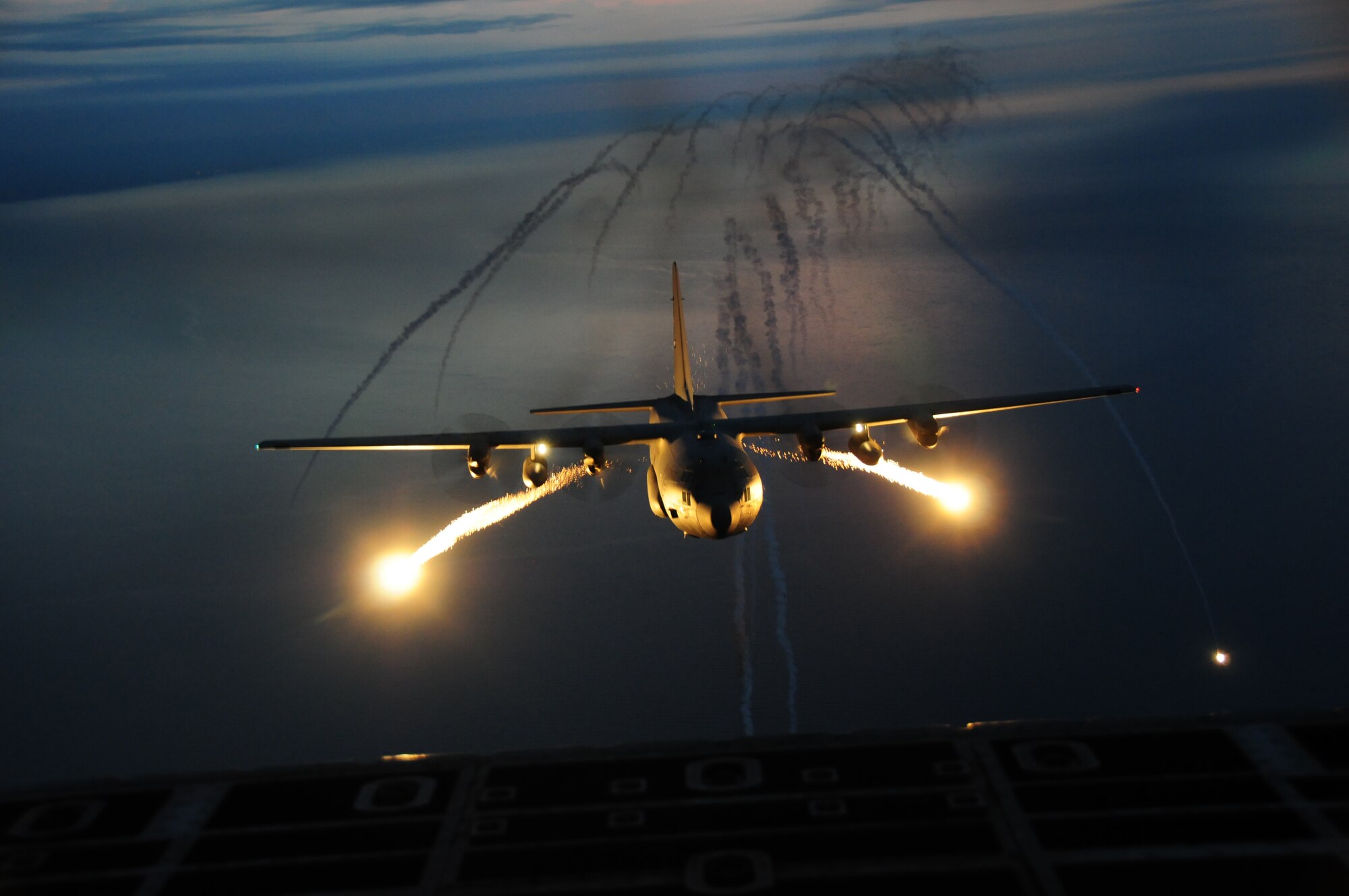 The 107th Airlift Wing went on another night formation training mission, this time fully loaded with live flares to be used in a training scenario.  A "Flare" is an aerial infrared countermeasure to counter and infrared homing (heat seeking) surface-to air or air-to-air missile.Sept. 25, 2012 (U.S. Air Force Photo/Senior Master Sgt. Ray Lloyd)
