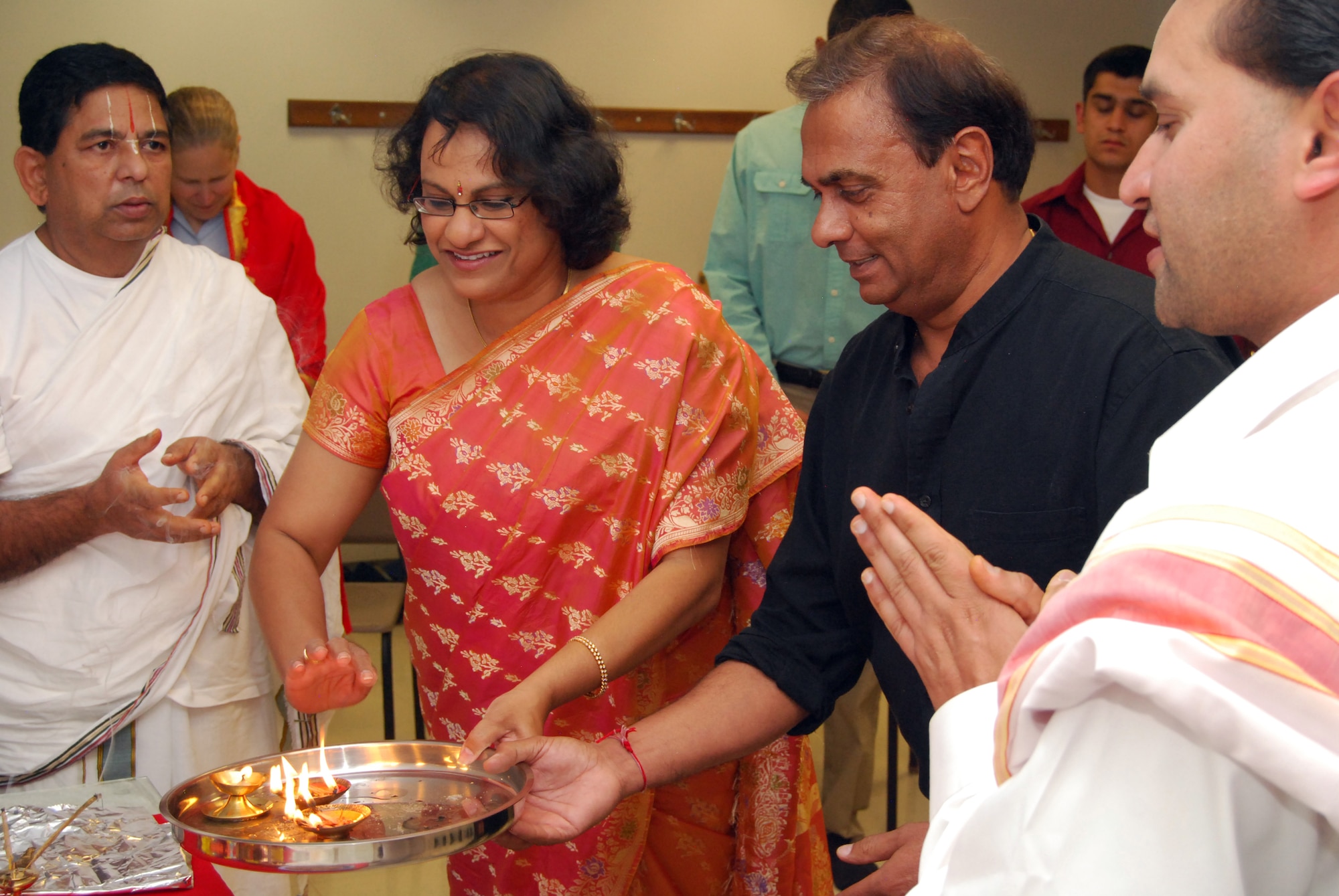 From left: Sitaramacharyalu Gunturu, Mythili Bachu, Jay Patel and Srinivasacharya Gudimella celebrate the birthday of Ganesha, one of the major gods of the Hindu pantheon, during a Sri Ganesh Chaturthi in the Air Force Academy Cadet Chapel's multipurpose room Sept. 21, 2012. Guntueu and Gudimella are priests with the Sri Venkateswara Temple of Colorado in Castle Rock, Colo. Bachu is the chairperson of the Council of Hindu Temples of North America and the mother of Cadet 3rd Class Anish Bachu. Patel is the Academy's Hindu lay leader. (U.S. Air Force photo/Don Branum)