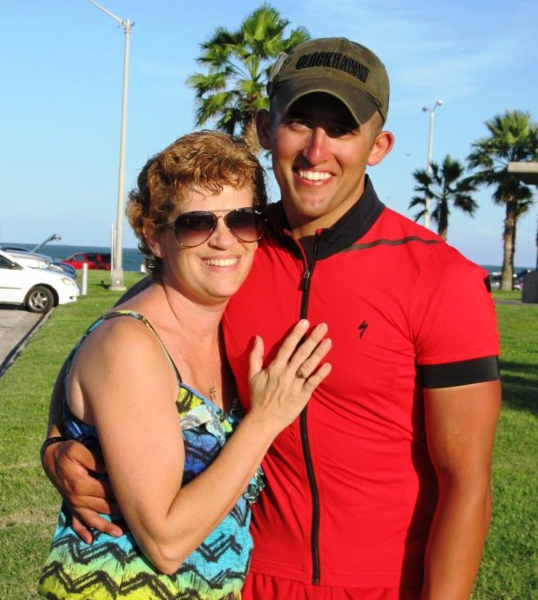 Sgt. Douglas A. McBroom, Rapid Port Opening Element, 690th Transportation Detachment, 833rd Transportation Battalion, 597th Transportation Brigade, embraces his mother after reaching Corpus Christi, Texas. McBroom decided he would show support for those fighting cancer by travelling 800 miles on his mountain bike to visit his mother.