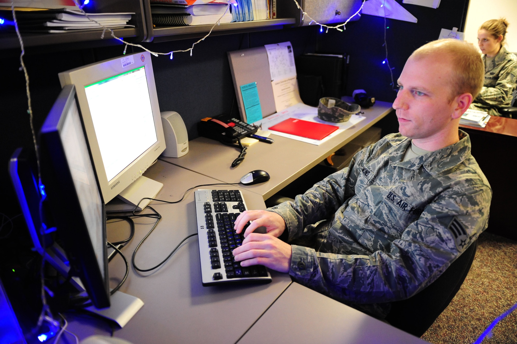 Computer programmer Senior Airman Zachariah Grummons works on a database at the Air Force Integrated Maintenance Data System Center located on Gunter Annex in Montgomery, Ala., Sept. 20.  Recently, Grummons submitted the paperwork for IDEA 2012-2069, “IMDS Automation and Expediency of Element Recycles,” saving the Air Force $111,625 annually and earning him a $10,000 check from the Air Force Innovative Development through Employee Awareness Program. (U.S. Air Force photo by Master Sgt. Michael Voss)