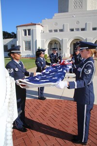 Members of Joint Base San Antonio-Randolph's Honor Guard perform the flagfolding detail during the POW/MIA Recognition Day ceremony Sept. 21.  (U.S. Air Force photo by Melissa Peterson)