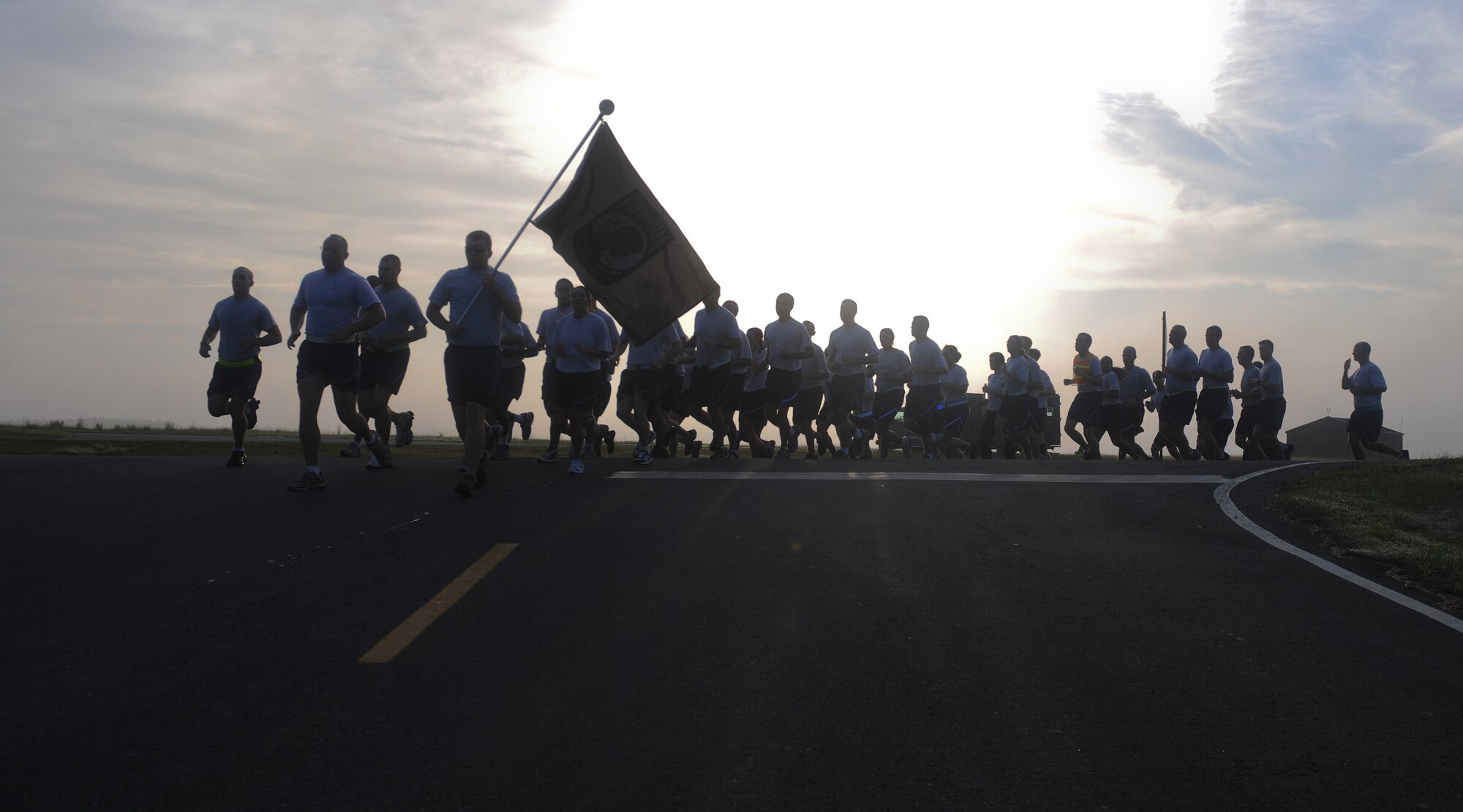 Moody Airmen take part in the 4th annual Tiger-thon run at Moody Air Force Base, Ga., Sept. 21, 2012. Individuals from various organizations on base joined together to participate in the 23 mile run in honor of all prisoners of war and missing in action, past and present. (U.S. Air Force photo by Airman 1st Class Olivia Dominique/Released)