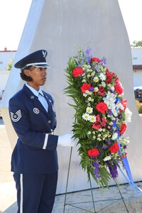 Tech. Sgt. Nidia Hodge NCOIC of Honor Guard a member of Joint Base San Antonio-Randolph's Honor Guard performs the wreath detail during the POW/MIA Recognition Day ceremony Sept. 21. (U.S. Air Force photo by Melissa Peterson)