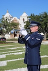 Airman 1st Class Logan Keese, Band of the West trumpet apprentice, performs "TAPS" during the POW/MIA Recognition Day ceremony Sept. 21. (U.S. Air Force photo by Melissa Peterson)