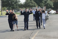 Potential victims are evacuated from a building during the Joint Base San Antonio-Randolph active shooter exercise Sept. 17 and 18. (U.S. Air Force photo by Don Lindsey)