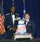 Gen. Edward A. Rice, Air Education and Training Command commander, and
Airman 1st Class Elizabeth Hunter from the 59th Medical Wing at Joint Base
San Antonio-Lackland, prepare to cut the birthday cake during the Air Force
65th Birthday Ball Sept. 21 at the Omni Hotel in San Antonio. 
(U.S. Air Force photo by Don Lindsey)
