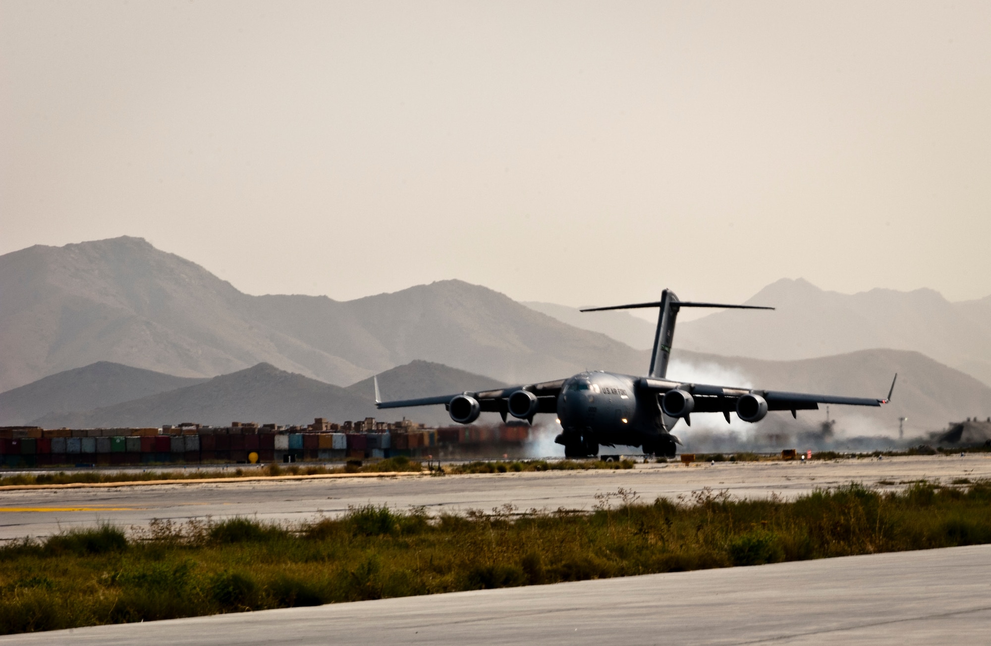 A U.S. Air Force C-17 Globemaster III lands at Bagram Airfield, Afghanistan, Sept. 25, 2012. The C-17 is capable of rapid strategic and tactical delivery of troops and any type of cargo to main operating bases or forward bases in Afghanistan. The aircraft can perform airlift, airdrop, and transport ambulatory patients during aeromedical evacuations when required. (U.S. Air Force Photo/Capt. Raymond Geoffroy)
