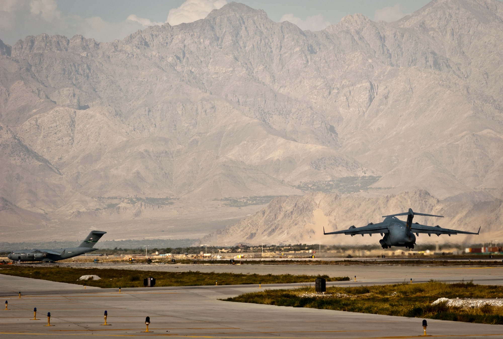 A U.S. Air Force C-17 Globemaster III takes off from Bagram Airfield, Afghanistan, Sept. 25, 2012. The C-17 is capable of rapid strategic and tactical delivery of troops and any type of cargo to main operating bases or forward bases in Afghanistan. The aircraft can perform airlift, airdrop, and transport ambulatory patients during aeromedical evacuations when required. (U.S. Air Force Photo/Capt. Raymond Geoffroy)