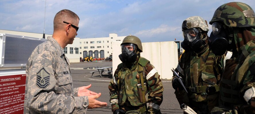 U.S. Air Force Master Sgt. David Nolen, Pacific Air Force Inspector, speaks to Airmen after chemical, biological, radiological and nuclear exercise during the consolidated unit inspection at Misawa Air Base, Japan, Sept. 20, 2012. The CUI, previously known as the unit compliance inspection, is an Air Force inspection administered every 12 to 48 months. The PACAF IG team gave the wing a “Satisfactory”, which means the 35th Fighter Wing is mission ready and capable (U.S. Air Force photo by Airman 1st Class Kenna Jackson)