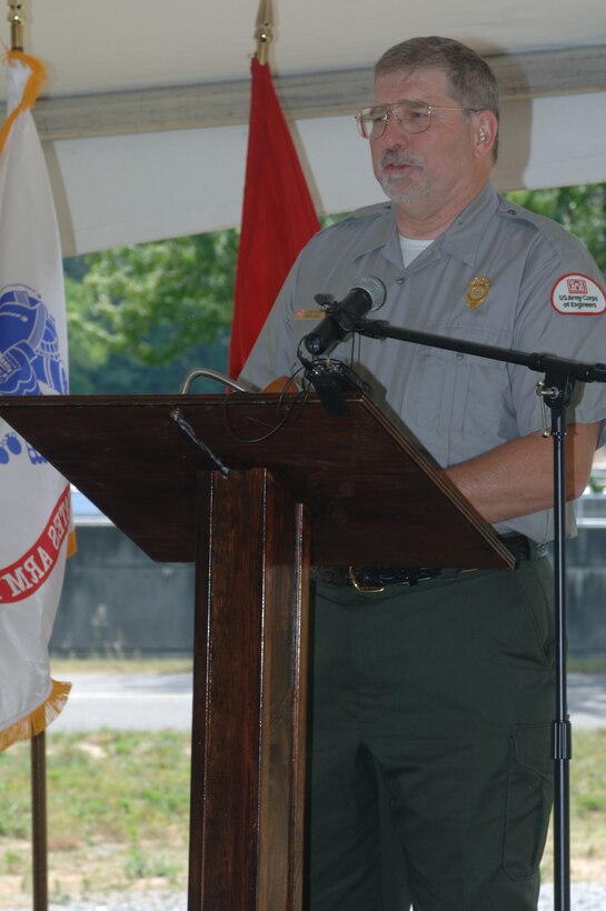 Cheatham Lake Resource Manager Larry Nash recalls the events of a flash flood May 2, 2010 that submerged the Cheatham Lake Resource Manager's Office and Lock Operations Center during a groundbreaking Ceremony June 18, 2012. High water caused major structural damage and stranded his employees who had to be rescued by boat when the flood waters rose. (USACE photo by Michael Rivera)