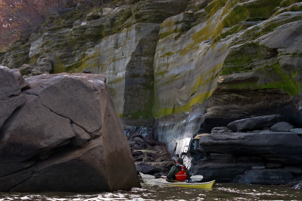 Kayaking along the bluffs of Lake Red Rock about 50 miles downstream of Des Moines on the Des Moines River. Lake Red Rock provides flood risk reduction as well as recreation, water supply, drought management and fish and wildlife management. Altered flows to the river and tributaries as well as impounded water have an effect on resident and migratory fish and mussels as well as wildlife that depend on aquatic, riparian, and floodplain habitat.