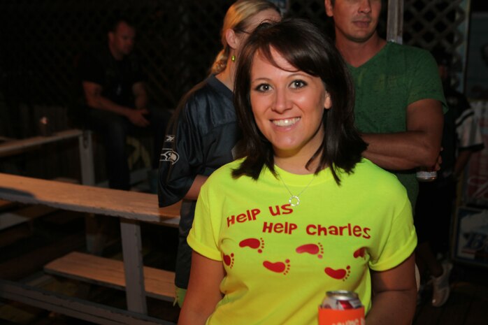 Sarah Mcgowan sports a 'help us help Charles' T-shirt during the benefit pub-crawl supporting local taxi driver Charles Hawkesworth, Sept. 16. Hawkesworth was assaulted the previous week, which led to the island quickly putting on a fundraiser pub-crawl to help pay for his medical bills and living expenses.
