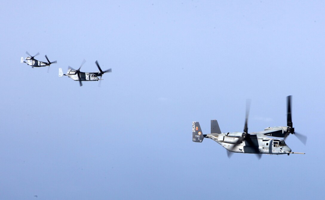 An MV-22B Ospreys with Marine Medium Tiltrotor Squadron 261 (Reinforced), 24th Marine Expeditionary Unit, fly in formation after conducting aerial refueling training operations, Sept 23, 2012. The training consisted of MV-22B Ospreys and AV-8B Harriers conducting aerial refueling with the 24th MEU's KC-130J Hercules planes to practice the skills needed for long-range flight operations. The 24th MEU is deployed with the Iwo Jima Amphibious Ready Group as a theater reserve and crisis response force for U.S. Central Command in the U.S. Navy's 5th Fleet area of responsibility. (U.S. Marine Corps photo by Cpl. Michael Petersheim)