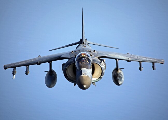 An AV-8B Harrier with Marine Medium Tiltrotor Squadron 261 (Reinforced), 24th Marine Expeditionary Unit, flies in position while conducting aerial refueling training operations, Sept 23, 2012. The training consisted of MV-22B Ospreys and AV-8B Harriers conducting aerial refueling with the 24th MEU's KC-130J Hercules planes to practice the skills needed for long-range flight operations.  The 24th MEU is deployed with the Iwo Jima Amphibious Ready Group as a theater reserve and crisis response force for U.S. Central Command in the U.S. Navy's 5th Fleet area of responsibility.