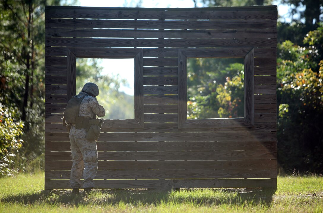 Lance Cpl. Elmo Hernandez, a bulk fuel specialist with 8th Engineer Support Battalion, 2nd Marine Logistics Group, engages a target during movement-to-contact training aboard Camp Lejeune, N.C., Sept. 25, 2012. During the training, 26 Marines with Bulk Fuel Company, 8th ESB maneuvered around team building obstacles to complete a course of 16 targets.