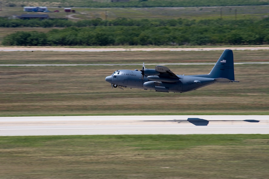 The last C-130 Hercules takes off from the runway Sept. 26, 2012, at Dyess Air Force Base, Texas. For 37 years Dyess’ C-130 Hercules and its Airmen have built a legacy in the Air Force. That legacy came to end Sept. 26 as the last two C-130 H models, tail numbers 1667 and 2063, departed for Little Rock AFB, Ark. (U.S. Air Force photo by Airman 1st Class Damon Kasberg/ Released)