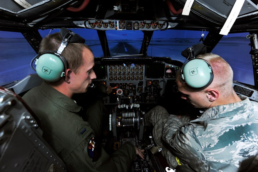 MINOT AIR FORCE BASE, N.D. -- B-52H Stratofortress pilots are now teaming up with maintainers to give them a feel for what it's like to fly the buff using the flight training simulator. Used as an incentive for top maintenance section performers, the program is also important in that it shows maintainers a different perspective of the mission and helps them realize how critical some of the systems they work on are. (U.S. Air Force photo/Senior Airman Jesse Lopez)