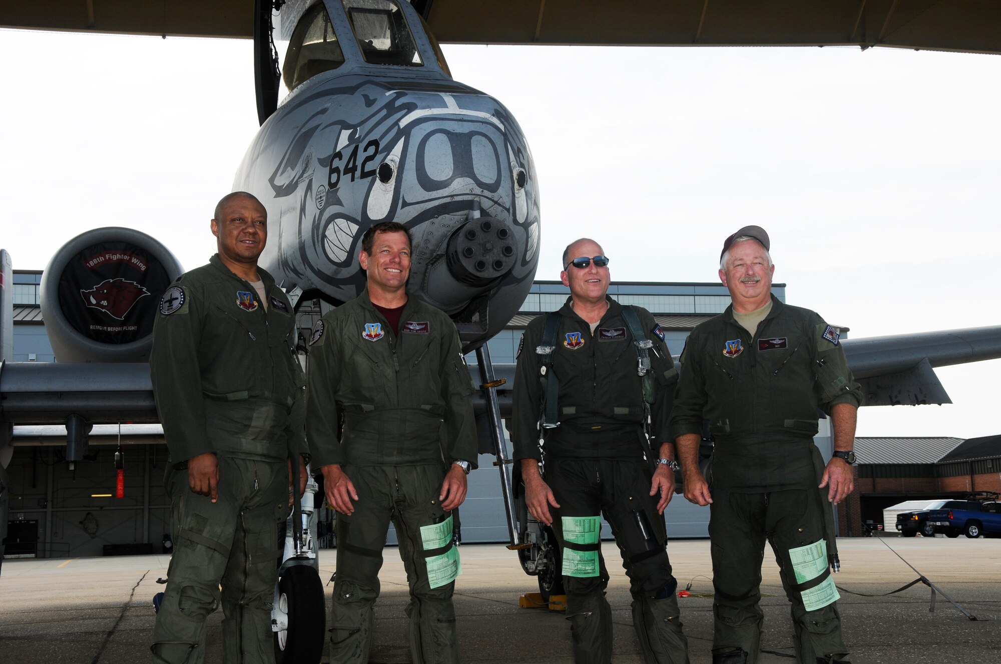 From left: Lt. Col. Tim Eddins, Lt. Col. Rod Vongrote, Lt. Col. Parker Pennings and Lt. Col. Mark Isenhower pose for a photo following their fini flights June 12. The four 188th Fighter Wing A-10C Thunderbolt II pilots recently retired from the Arkans...as Air National Guard. Collectively, the foursome accumulated 107 years of experience and logged more than 12,500 flight hours. Isenhower retired Sept. 30 after flying the F-4 Phantom, F-16 Falcon, A-10, T-38 and T-37 during his 29-year career. Eddins retired Aug. 9 after flying the F-16, A-10, T-38 and T-37 during his 32-year career. Pennings retired Aug. 12 and flew the F-16, A-10 and T-38 during his 24-year career. Vongrote’s 22-year career was spent flying the F-16, A-10 and T-38. (National Guard photo by Senior Airman Hannah Landeros/188th Fighter Wing Public Affairs)