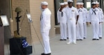 Two fallen Navy corpsmen were honored during a memorial ceremony at the Medical Education and Training Campus Sept. 20. Hospital Corpsman First Class Darrel Enos and Hospital Corpsman Third Class Clayton Beauchamp were remembered by a gathering of METC and Navy senior leadership, staff and students of the Basic Medical Technician Corpsman Training Program, METC’s combined Navy corpsman and Air Force medical technician schoolhouse, and members of the American Association of Navy Corpsmen. Beauchamp’s brother, Hospital Corpsman Second Class Christopher Beauchamp, attended the ceremony from the Naval Branch Health Clinic, Fort Worth, Texas, and delivered remarks about his brother during the ceremony. PHOTO BY LISA BRAUN