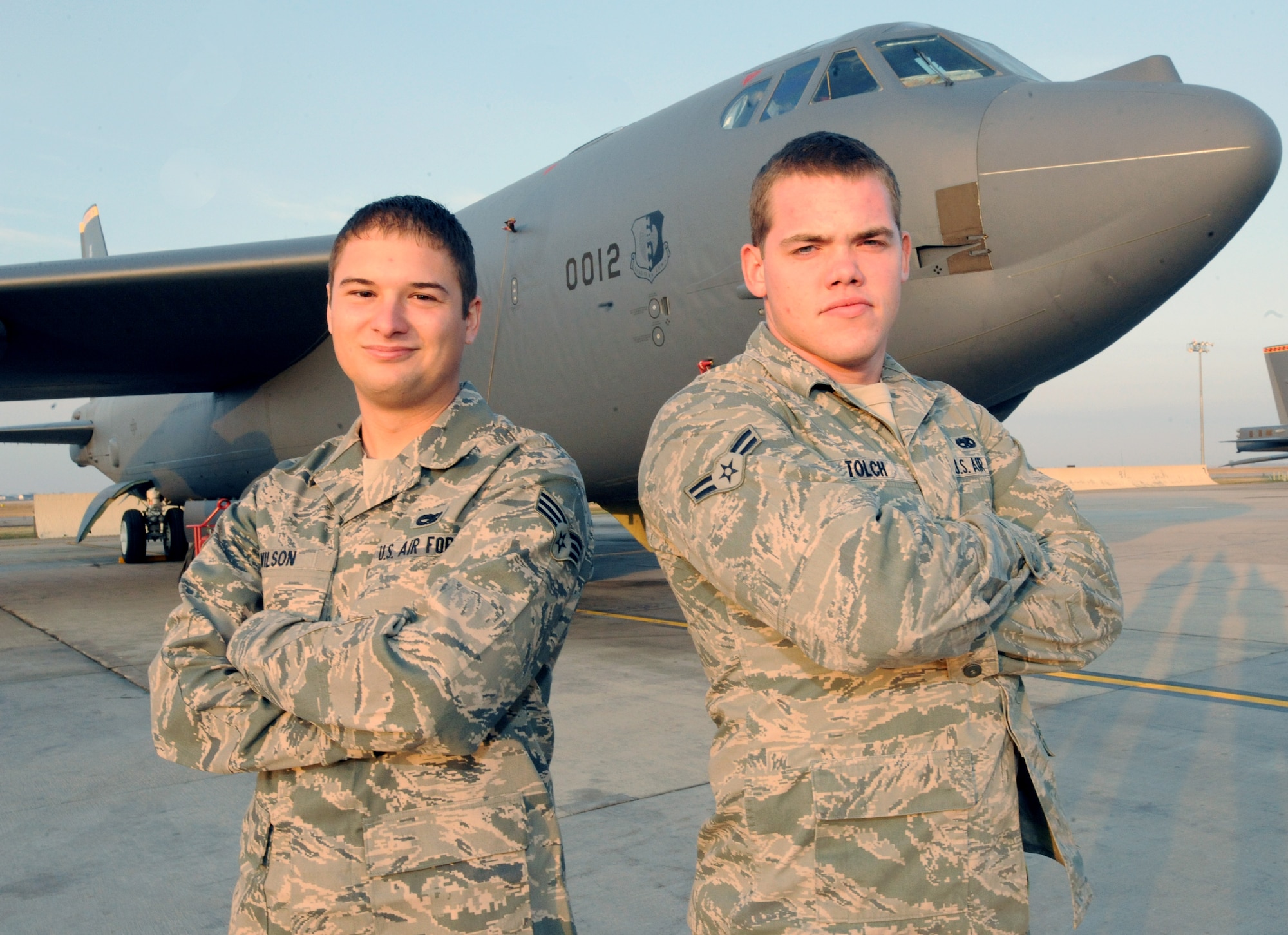 MINOT AIR FORCE BASE, N.D. -- Senior Airman Broc Wilson and Airman 1st Class Christopher Tolch, 5th Aircraft Maintenance assistant dedicated crew chiefs, helped to prevent the spread of a potentially disastrous fire involving a B-52H Stratofortress earlier this month, when flammable hydraulic fluid leaked onto a hot brake surface. (U.S. Air Force photo/Senior Airman Jose L. Hernandez)
