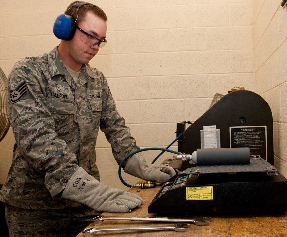 Staff Sgt. Justin Halford, 28th Maintenance Squadron electro-environmental technician, fills a carbon dioxide life raft bottle during routine maintenance in the electro-environmental shop on Ellsworth Air Force Base, S.D., Sept. 24, 2012. Electro-environmental technicians provide all electrical and environmental parts of the base’s B-1 fleet, such as oxygen tanks, carbon dioxide tanks, and B-1 batteries, ensuring they’re ready to respond at anytime around the globe. (U.S. Air Force photo by Airman 1st Class Kate Thornton-Maurer/Released)