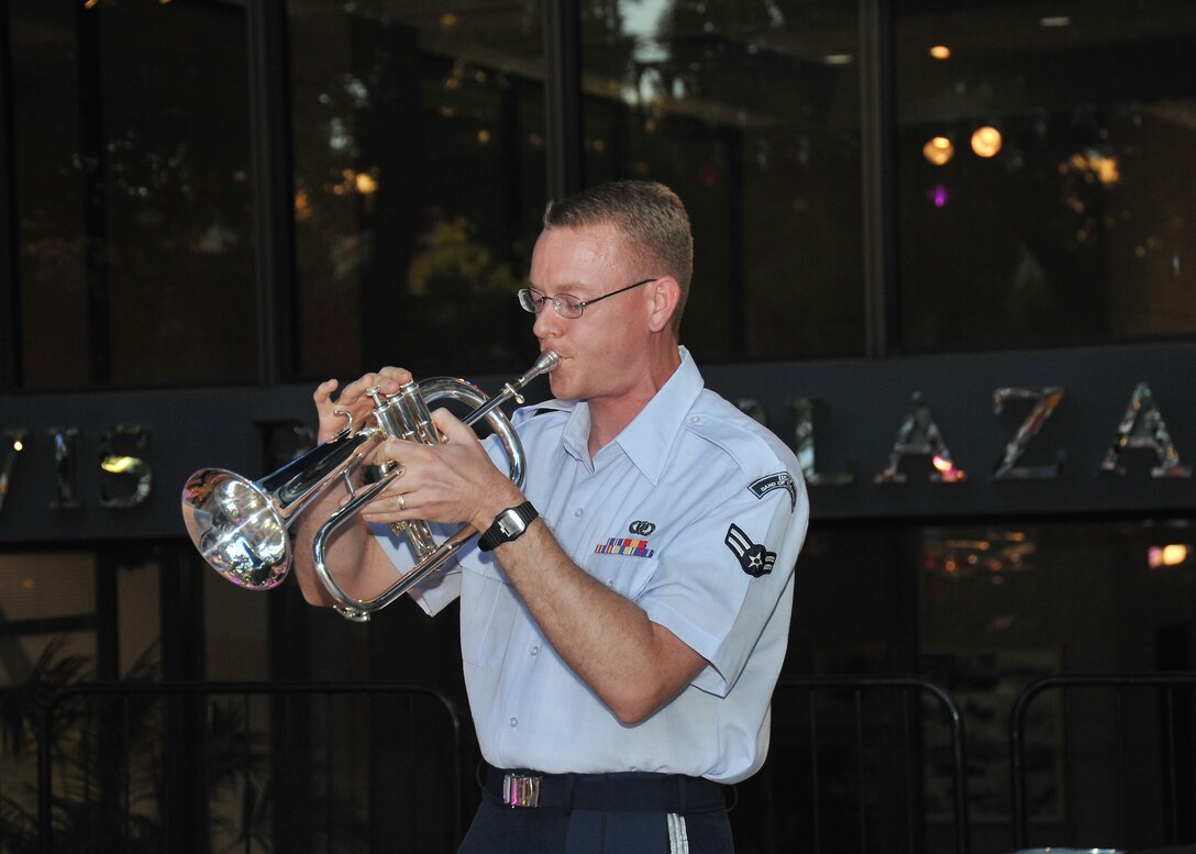 A1C Thrower adding mellow sounds with his flugelhorn at the 2012 Jazz SA Live Festival in downtown San Antonio, TX. 
