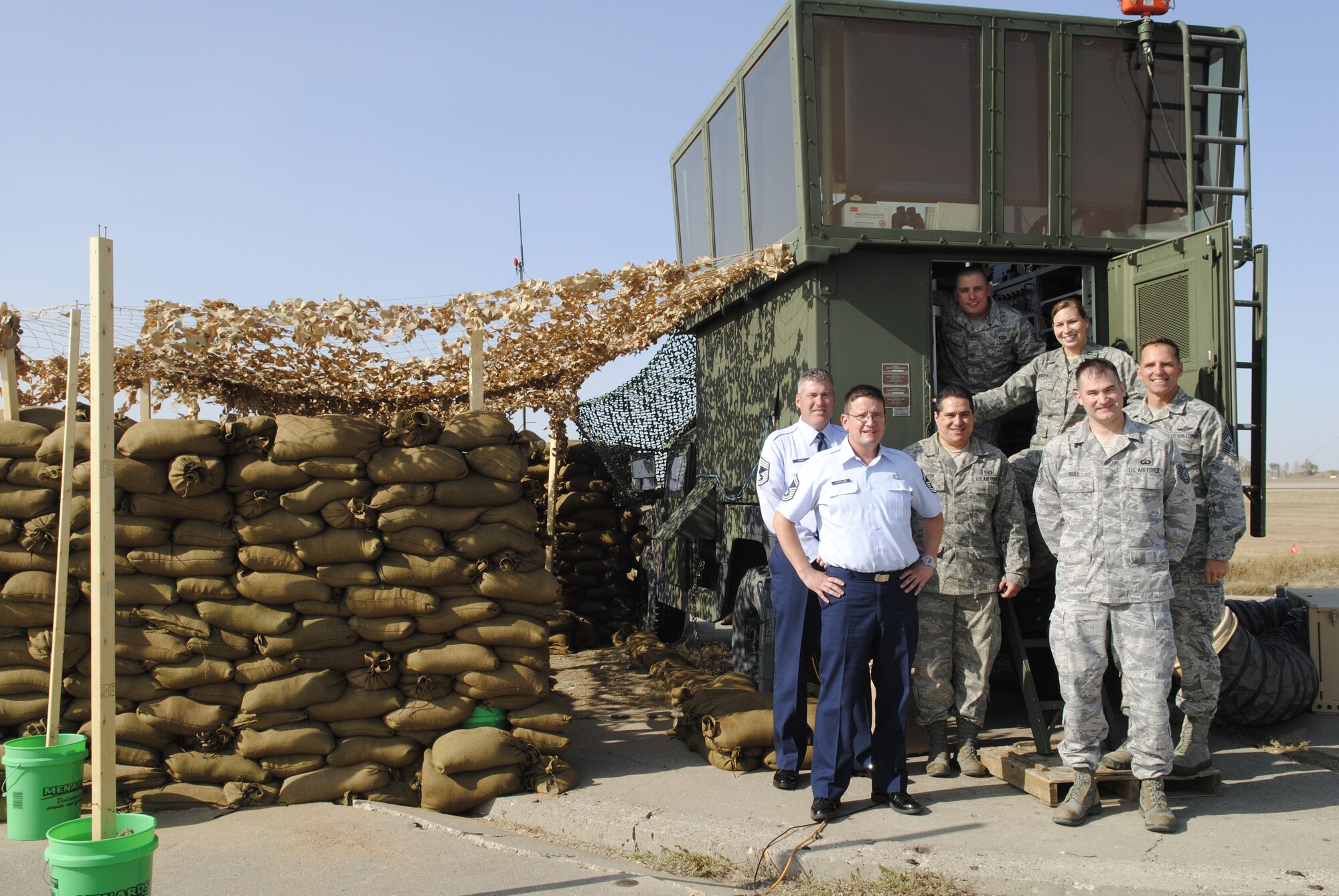 MINOT AIR FORCE BASE, N.D. -- Currently operating out of a deployable air traffic control tower, the air traffic controllers of the 5th Operations Support Squadron are responsible for safe, efficient and expeditious aircraft operations within the terminal airspace of Minot Air Force Base. Air Traffic Controllers are essential components to the B-52H Stratofortress,' and the UH-1N Huey's operations, which are crucial for the success of the nuclear enterprise. The new Minot Control Tower is under construction and is estimated to be finished May 2013. (U.S. Air Force photo/Staff Sgt. Carmen Washington)