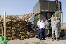 MINOT AIR FORCE BASE, N.D. -- Currently operating out of a deployable air traffic control tower, the air traffic controllers of the 5th Operations Support Squadron are responsible for safe, efficient and expeditious aircraft operations within the terminal airspace of Minot Air Force Base. Air Traffic Controllers are essential components to the B-52H Stratofortress,' and the UH-1N Huey's operations, which are crucial for the success of the nuclear enterprise. The new Minot Control Tower is under construction and is estimated to be finished May 2013. (U.S. Air Force photo/Staff Sgt. Carmen Washington)