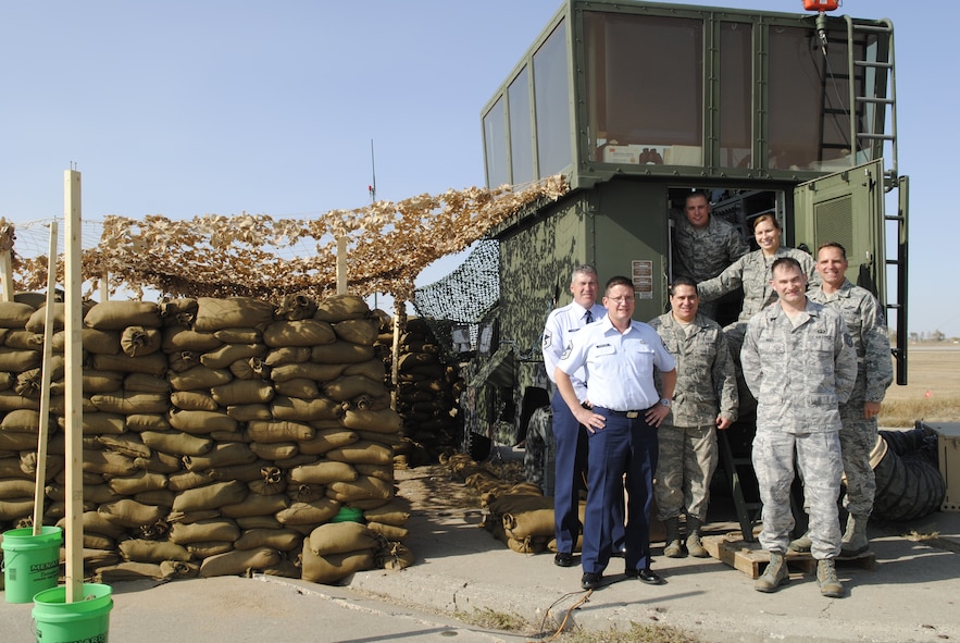 MINOT AIR FORCE BASE, N.D. -- Currently operating out of a deployable air traffic control tower, the air traffic controllers of the 5th Operations Support Squadron are responsible for safe, efficient and expeditious aircraft operations within the terminal airspace of Minot Air Force Base. Air Traffic Controllers are essential components to the B-52H Stratofortress,' and the UH-1N Huey's operations, which are crucial for the success of the nuclear enterprise. The new Minot Control Tower is under construction and is estimated to be finished May 2013. (U.S. Air Force photo/Staff Sgt. Carmen Washington)