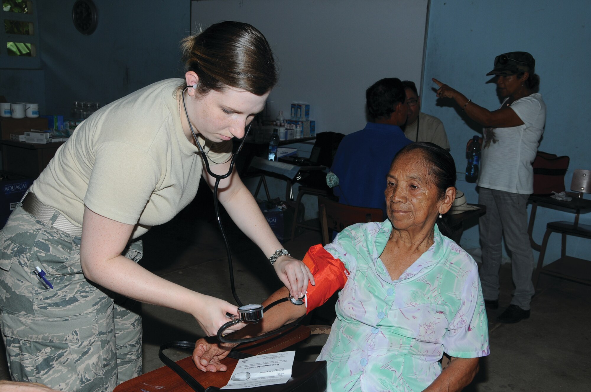 WRIGHT-PATTERSON AIR FORCE BASE, Ohio - Staff Sgt. Jennifer Reckner, 445th Airlift Wing Aerospace Medicine Squadron aerospace medical services craftsman, checks the blood pressure of a patient in Tucue´ Village, Coclé District in Panama, Aug. 22, 2012.  Thirty members from the 445th Airlift Wing descended upon Panama for the Panama Medical Readiness Training Exercise Aug. 18-31, providing medical services to 5,000 residents who have little or no access to medical care. (U.S. Air Force photo/Tech. Sgt. Anthony G. Springer)
