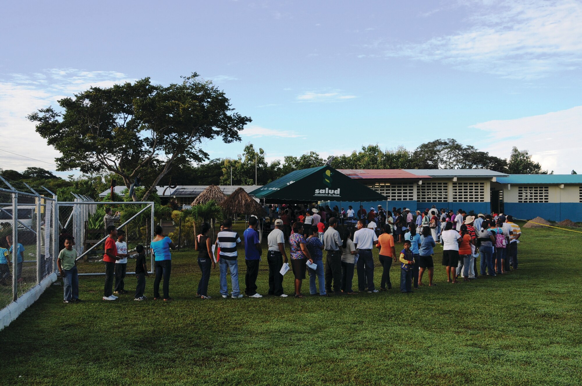 WRIGHT-PATTERSON AIR FORCE BASE, Ohio - Hundreds of residents from Tucue´ Village, Coclé District in Panama wait in line for medical screenings and treatment at a local school Aug. 20, 2012. Thirty members from the 445th Airlift Wing descended upon Panama for the Panama Medical Readiness Training Exercise Aug. 18-31, providing medical services to 5,000 residents who have little or no access to medical care. (U.S. Air Force photo/Tech. Sgt. Anthony G. Springer)
