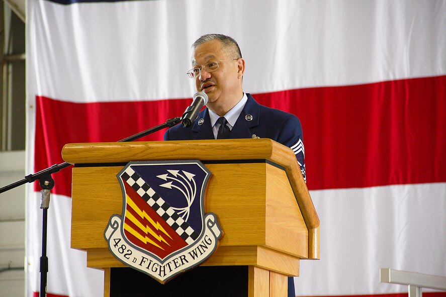 Chief Master Sgt. Lawrence H. Chang shares his philosophy on mentorship during his retirement ceremony at Homestead Air Reserve Base, Sept. 8. “Chief Master Sgt. Chang has had a significant impact on Homestead ARB,” said Chief Master Sgt. Katdo Robinson, 482nd Maintenance Squadron superintendent. “He spent more than 21 years here mentoring and leading Airmen and sharing his vision. His friends and family are in Homestead,  so he requested to hold his retirement here. We were more than happy to oblige.”