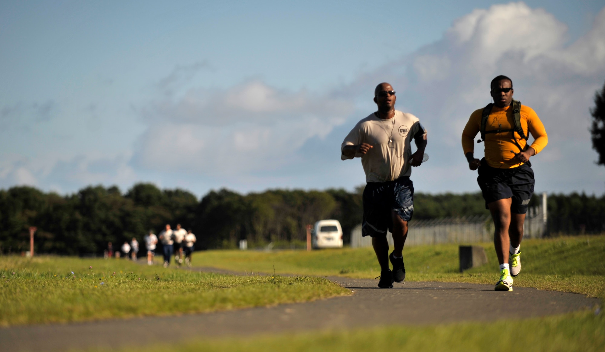 Members of the Misawa Security Operations Center run during the first Chief Warrant Officer 4 Brian Lawter Memorial Run at Misawa Air Base, Japan, Sept. 26, 2012. The MSOC hosted the run in honor of the late CW4 Brian Lawter, former Intel Oversight Officer there.  Lawter, a dedicated runner, frequently ran the perimeter road around the base. (U.S. Air Force photo by Staff Sgt. Nathan Lipscomb)