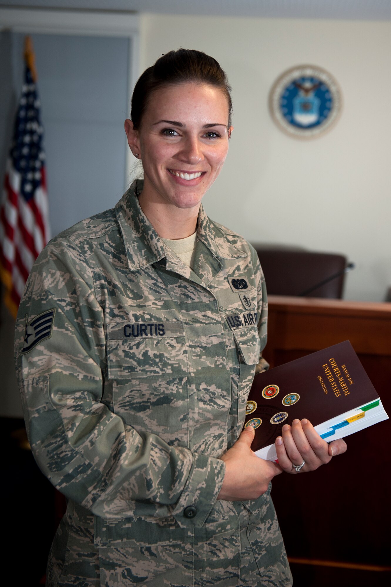 SPANGDAHLEM AIR BASE, Germany -- Staff Sgt. Charlotte Curtis, 52nd Fighter Wing legal office general law paralegal, is the Super Saber Performer for the week of Sept. 27 - Oct. 3. (U.S. Air Force photo by Airman 1st Class Gustavo Castillo/Released)

