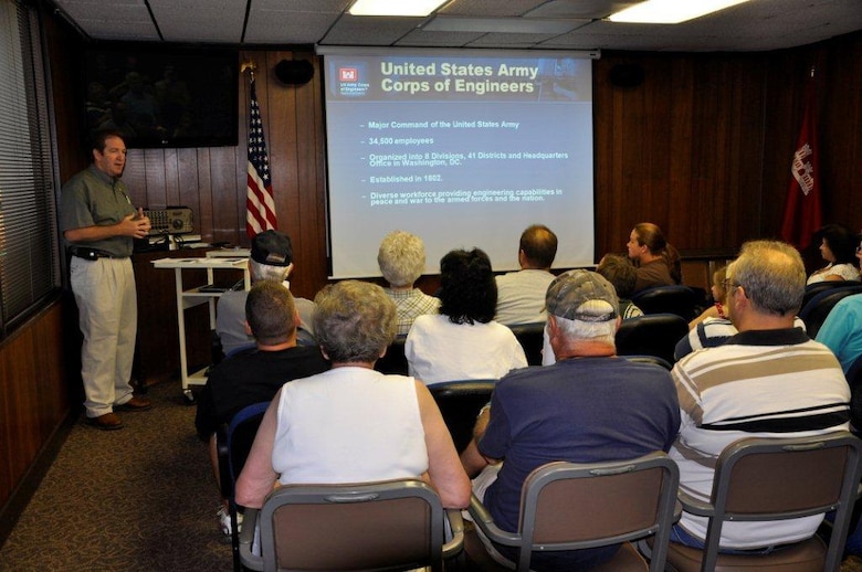 Mike Looney (Left), resource manager at Lake Barkley, briefs visitors June 23, 2012 at an open house prior to their touring the U.S. Army Corps of Engineers Nashville District’s Barkley Power Plant and Lock. Public access to these areas had been restricted since the 9-11 terrorist attacks. (USACE photo by Fred Tucker)